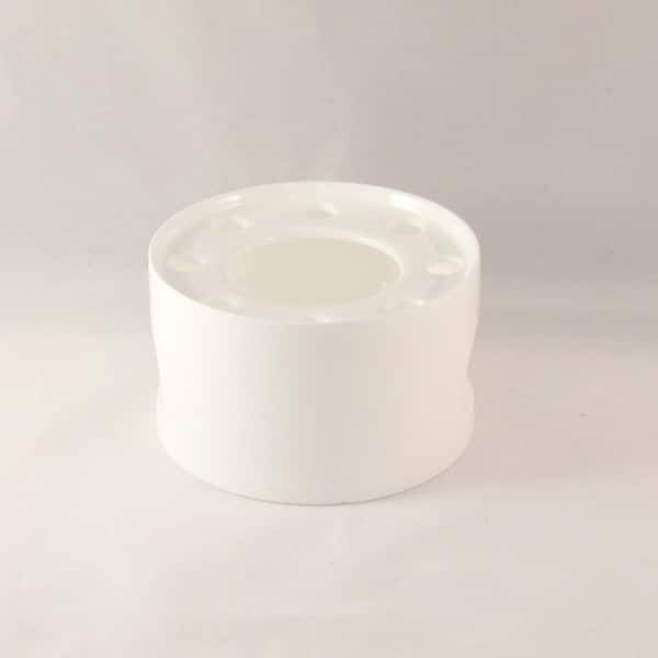 chauffe théière en porcelaine